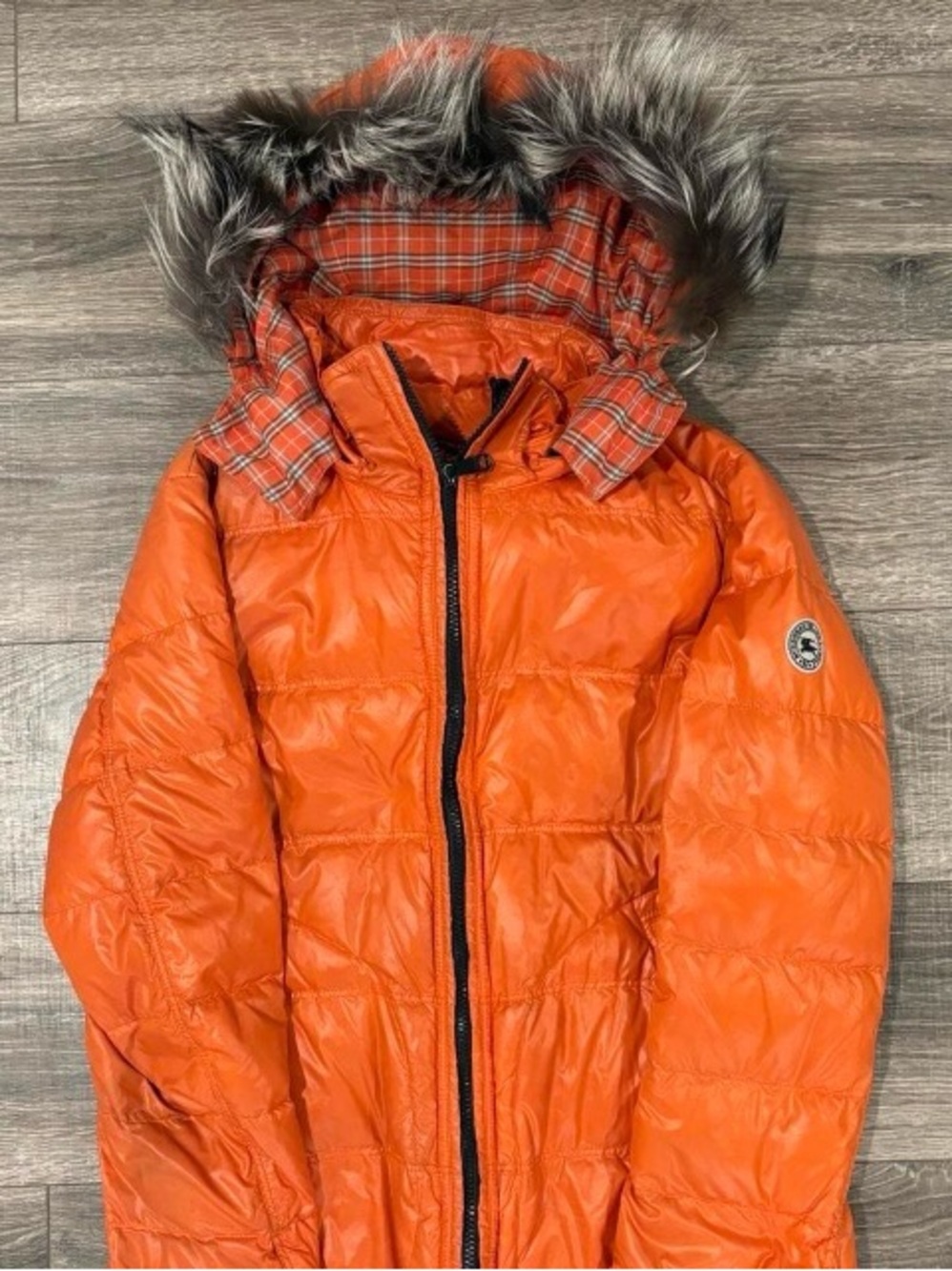 Burberry Black Label Orange 2 in 1 orange real fur puffer jacket. This jacket is